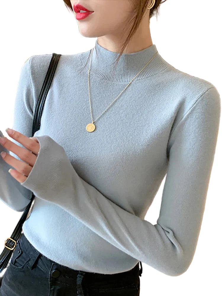 "Dam stickad turtleneck tröja långärmad, mjuk struktur och elegant design, perfekt för kyliga dagar."