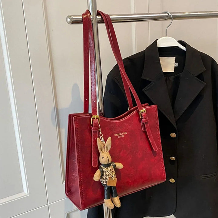 "Dam tote väska i elegant PU-läder med avtagbar kanin charm, stilren design, perfekt för dagligt bruk."