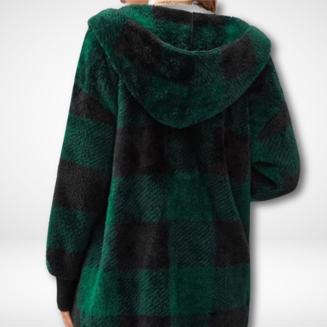 "Dam vattentät rutig cardigan i elegant design, visar stilikonisk och funktionell modekofta för kalla och regniga dagar."