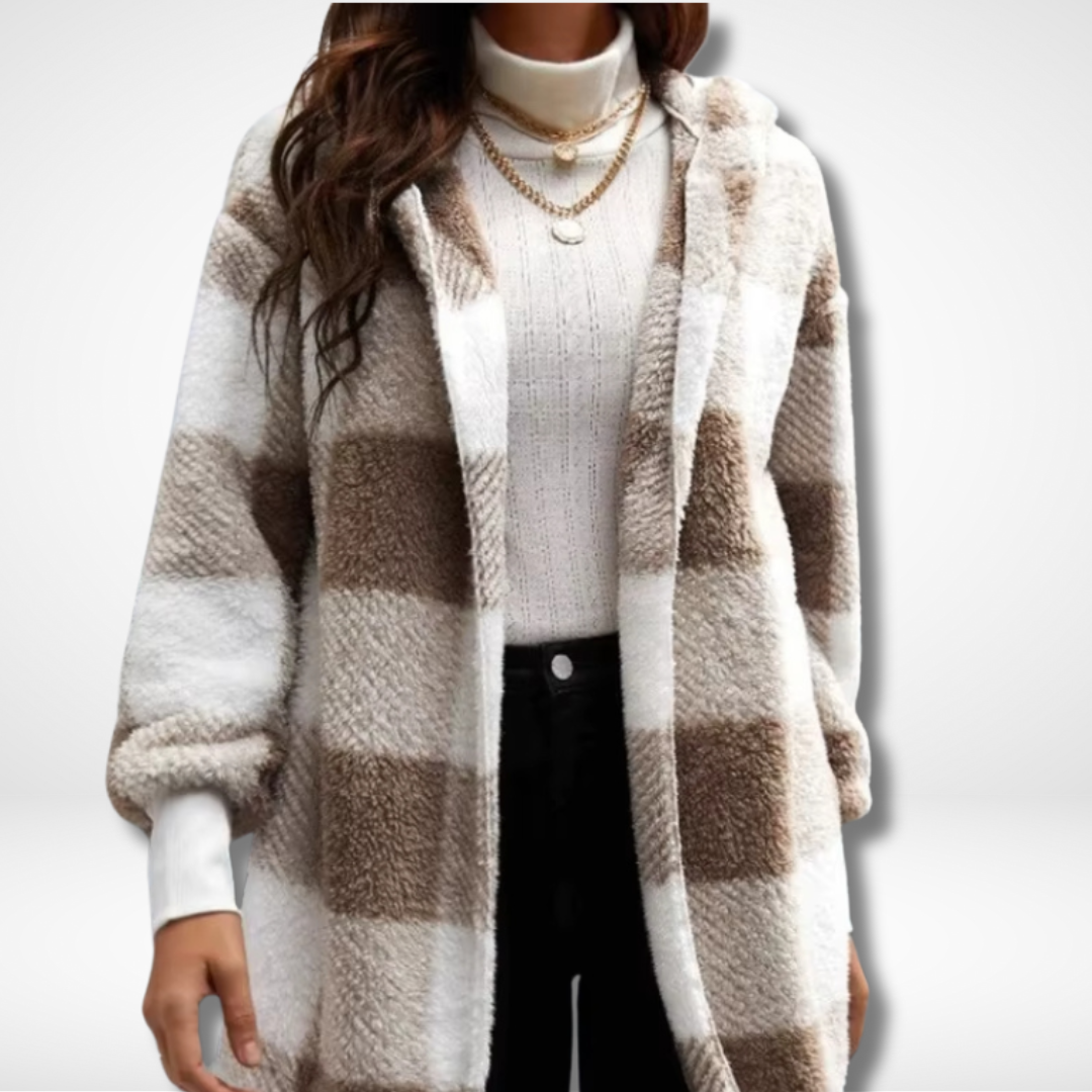 "Dam vattentät rutig cardigan i elegant design, visar stilikonisk och funktionell modekofta för kalla och regniga dagar."