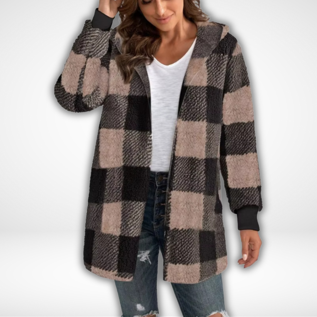"Dam vattentät rutig cardigan i elegant design, visar stilikonisk och funktionell modekofta för kalla och regniga dagar."
