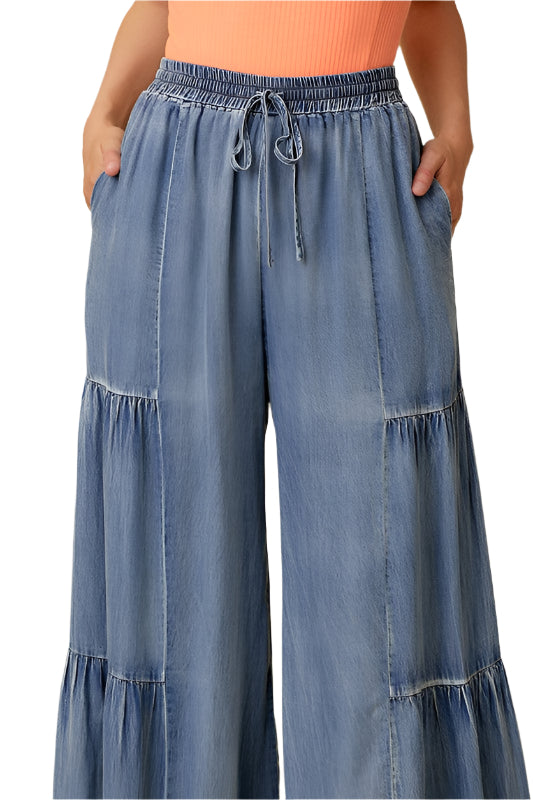 "Dam vida jeans med volanger, tvättad denim, elegant stil och avslappnad passform, perfekt för alla tillfällen."