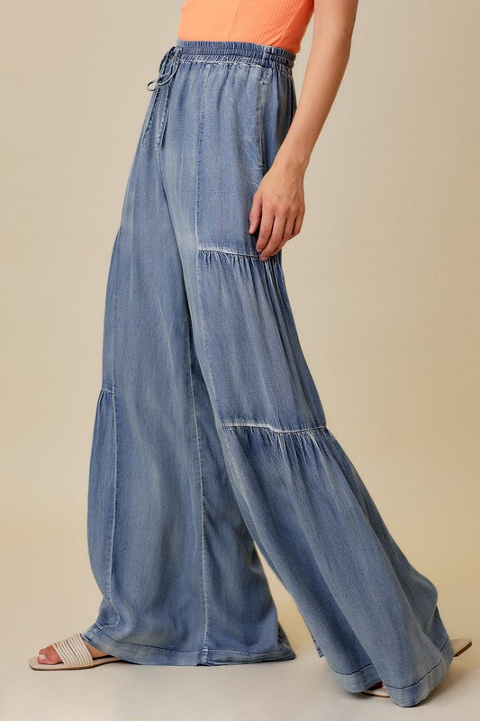 "Dam vida jeans med volanger, tvättad denim, elegant stil och avslappnad passform, perfekt för alla tillfällen."