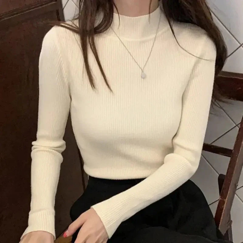 "Dam vintage stickad tröja med mock neck, flera färger. Elegant och varm design för kyliga dagar, perfekt för garderoben."
