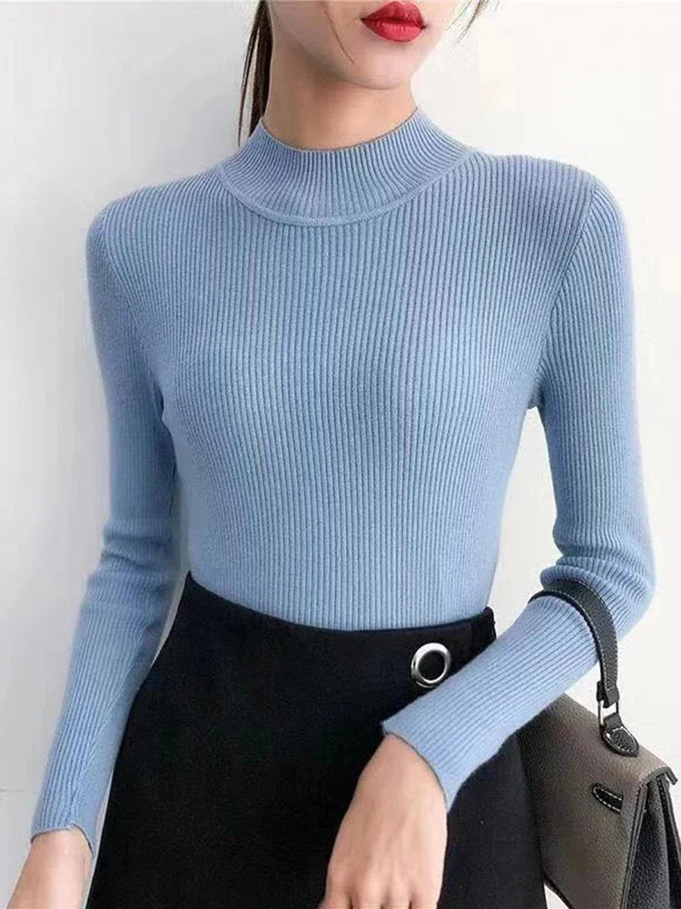 "Dam vintage stickad tröja med mock neck, flera färger. Elegant och varm design för kyliga dagar, perfekt för garderoben."