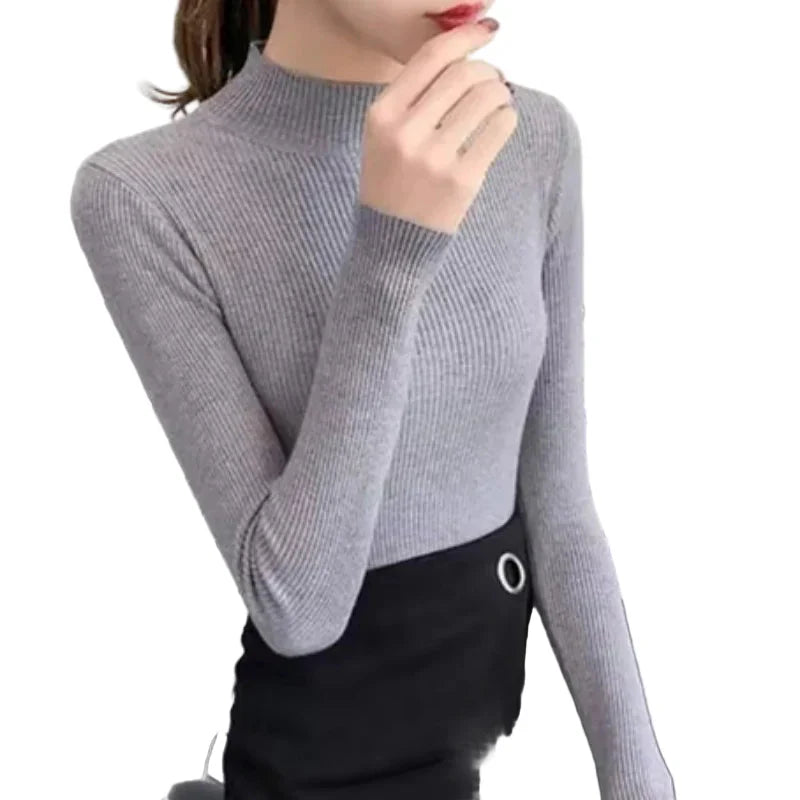 "Dam vintage stickad tröja med mock neck, flera färger. Elegant och varm design för kyliga dagar, perfekt för garderoben."