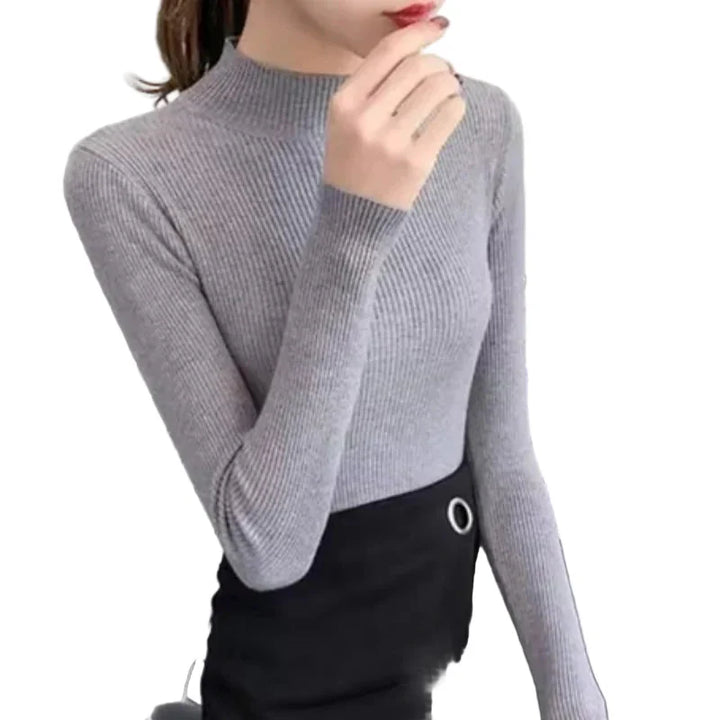 "Dam vintage stickad tröja med mock neck, flera färger. Elegant och varm design för kyliga dagar, perfekt för garderoben."