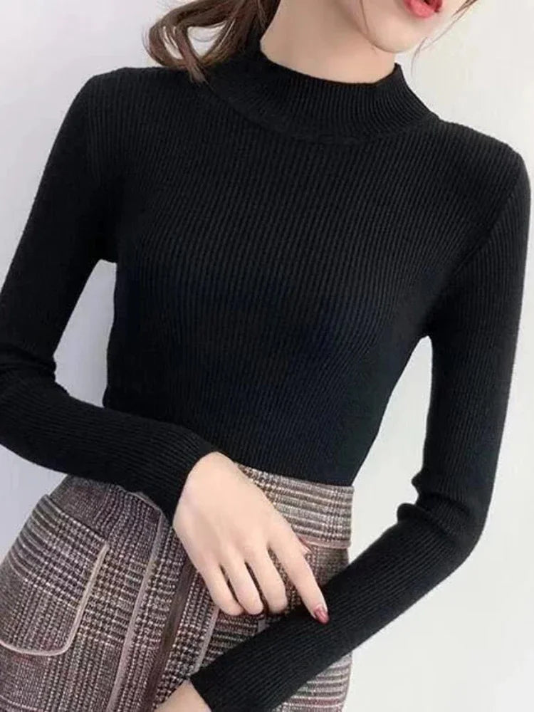 "Dam vintage stickad tröja med mock neck, flera färger. Elegant och varm design för kyliga dagar, perfekt för garderoben."