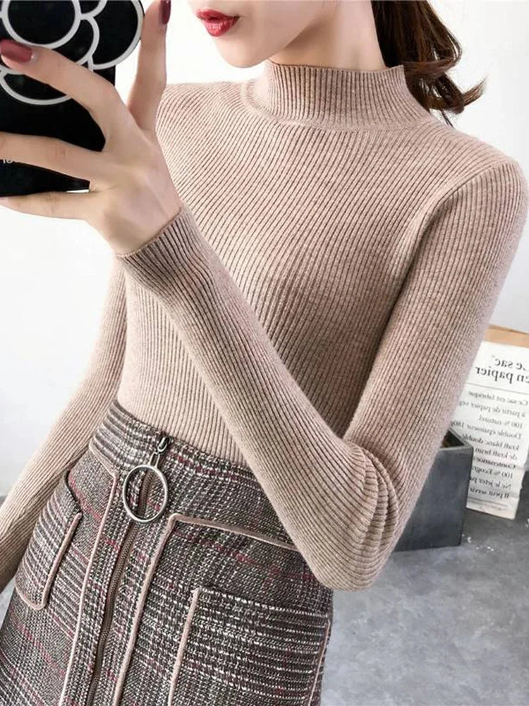 "Dam vintage stickad tröja med mock neck, flera färger. Elegant och varm design för kyliga dagar, perfekt för garderoben."
