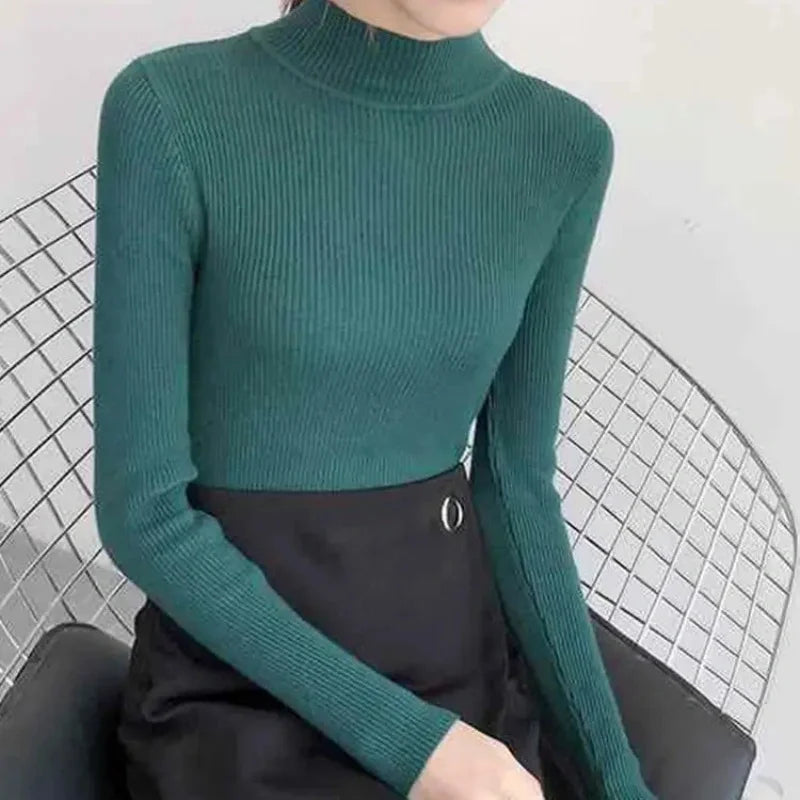 "Dam vintage stickad tröja med mock neck, flera färger. Elegant och varm design för kyliga dagar, perfekt för garderoben."