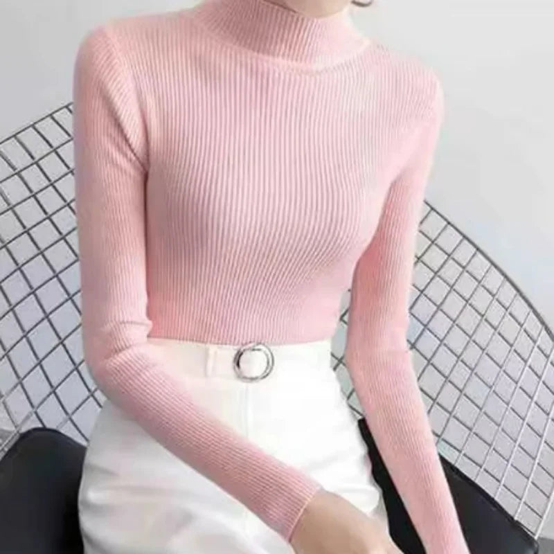 "Dam vintage stickad tröja med mock neck, flera färger. Elegant och varm design för kyliga dagar, perfekt för garderoben."