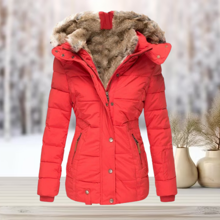 "Dam vinterjacka med avtagbar pelshette och glidelås, stilren design i hållbar bomull-polyesterblandning."