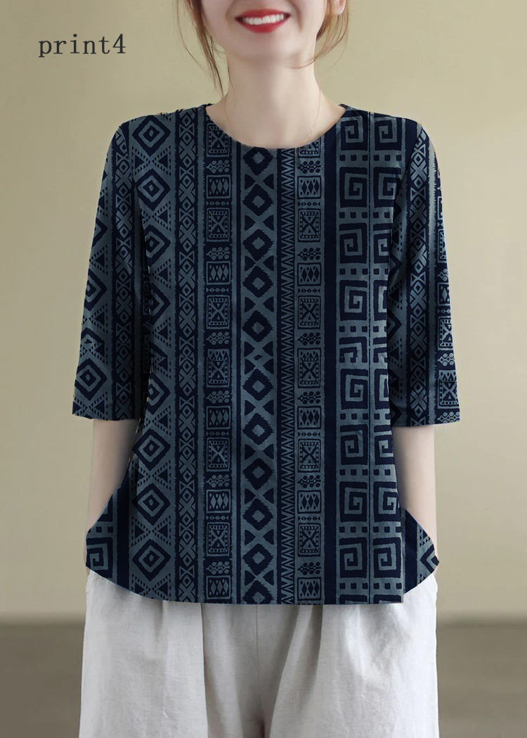 "Damblus med O-hals i bomull, elegant broderi, halv ärm för komfort och stil vid alla tillfällen. Perfekt passform."