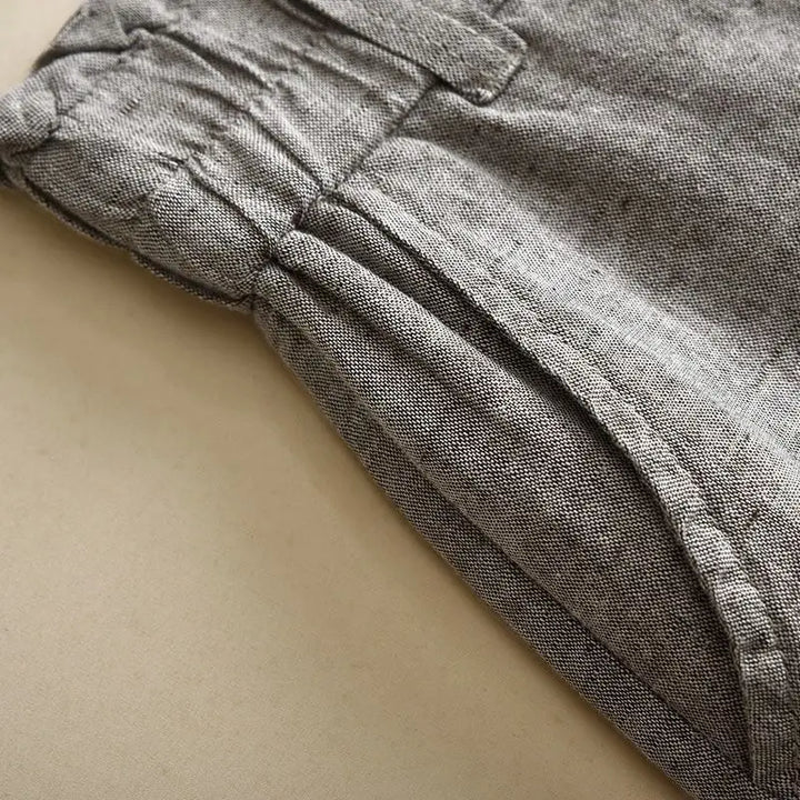 "Dambyxor hög midja elastisk, beige och grå, vida ben, mjukt material, stilfull och bekväm design för kvinnor."