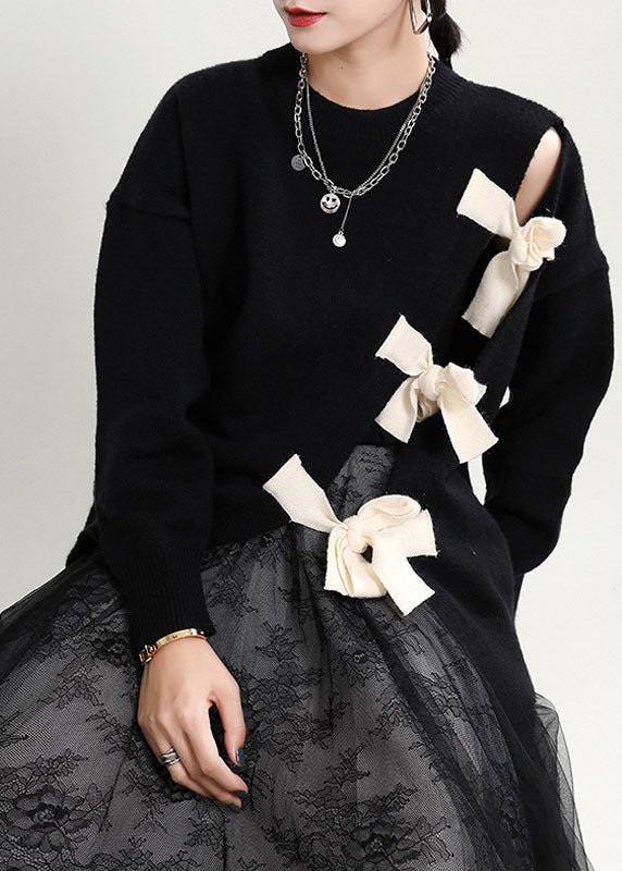 "Damens asymmetriska patchwork tröja i bomull, loose fit, trendig design för stilsäkra och bekväma outfits."