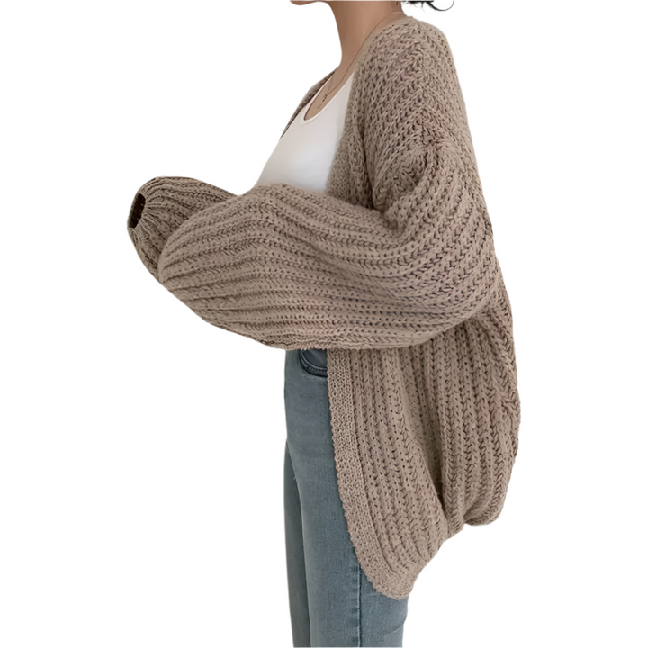 "Damens chunky stickad oversized cardigan i mjuk akryl, avslappnad passform, ribbad textur, perfekt för lager-på-lager."