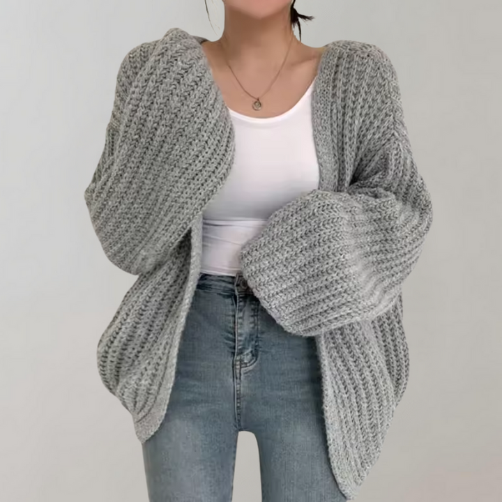 "Damens chunky stickad oversized cardigan i mjuk akryl, avslappnad passform, ribbad textur, perfekt för lager-på-lager."