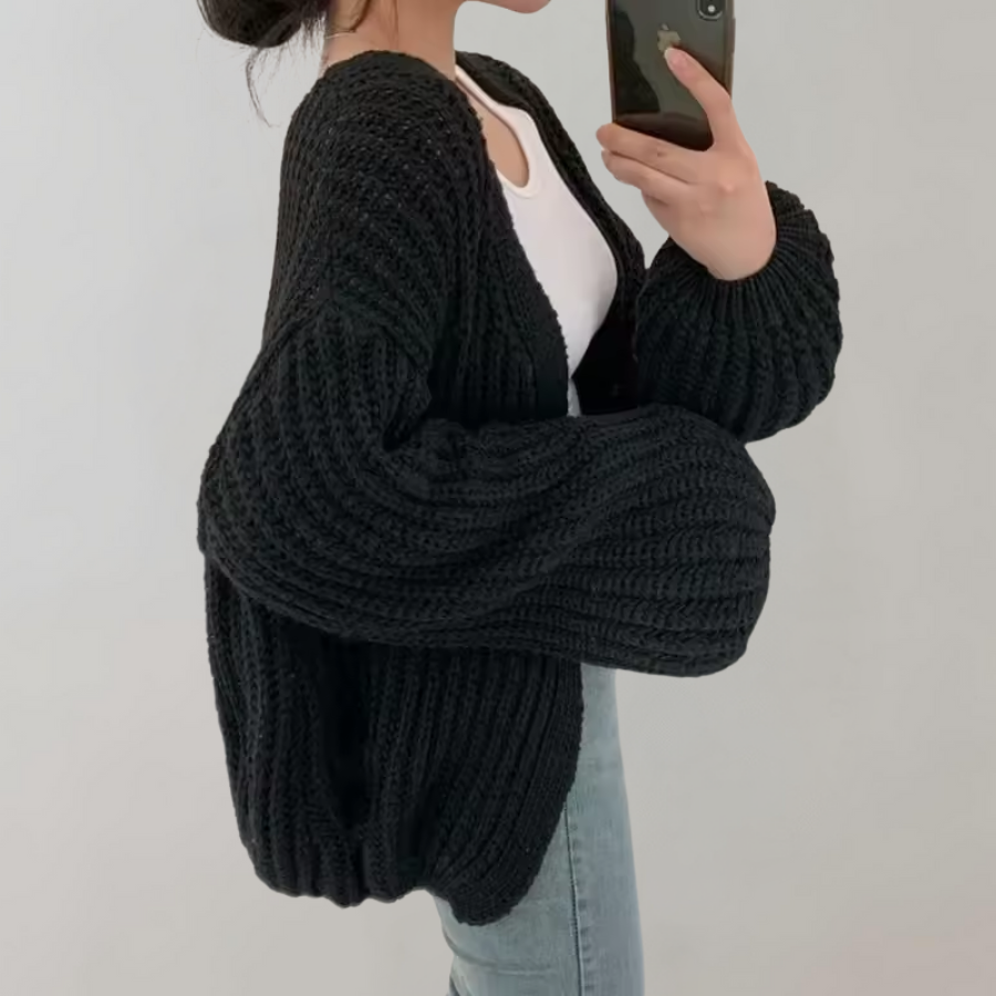 "Damens chunky stickad oversized cardigan i mjuk akryl, avslappnad passform, ribbad textur, perfekt för lager-på-lager."