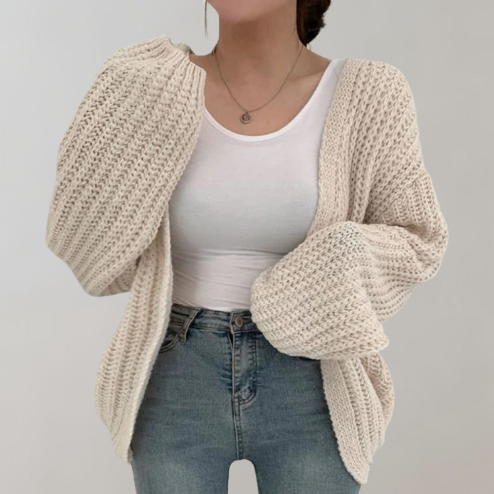 "Damens chunky stickad oversized cardigan i mjuk akryl, avslappnad passform, ribbad textur, perfekt för lager-på-lager."