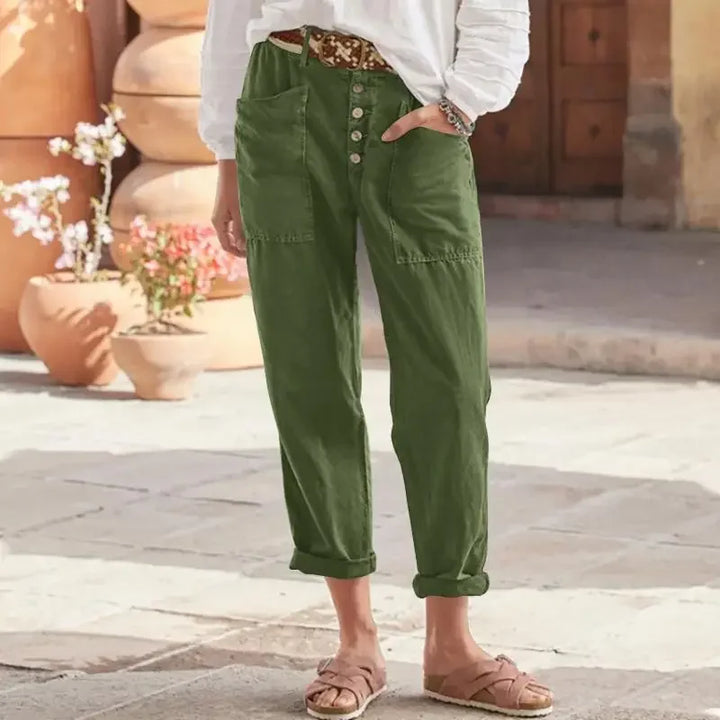 "Damer oversize långa byxor med fickor i bomull och linne, framifrån bild. Perfekt sommarplagg för stil och komfort."
