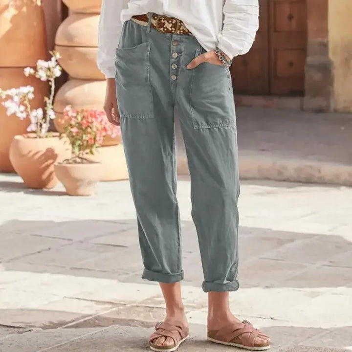 "Damer oversize långa byxor med fickor i bomull och linne, framifrån bild. Perfekt sommarplagg för stil och komfort."