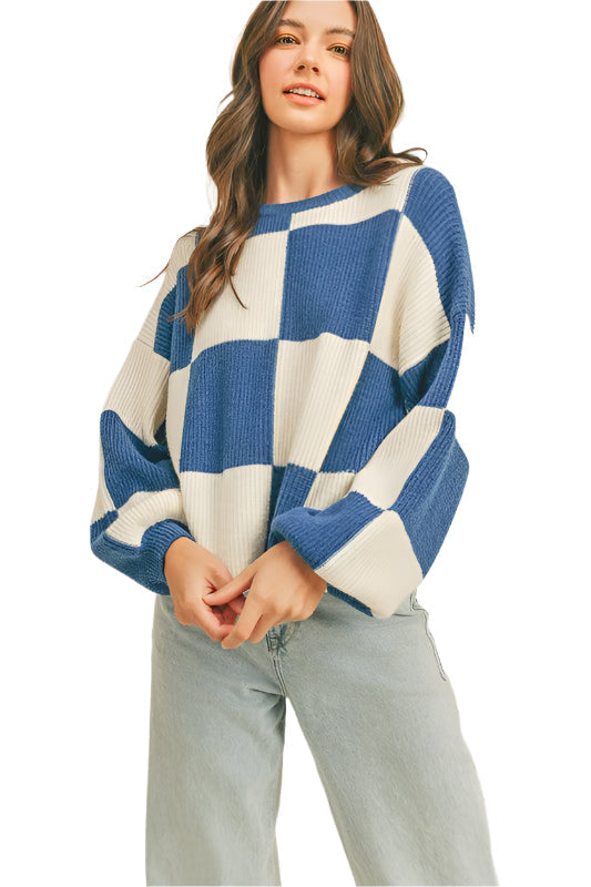 "Damer oversized pullover med rutigt mönster i mjuk fiber, avslappnad passform och stilren design för kyliga dagar."
