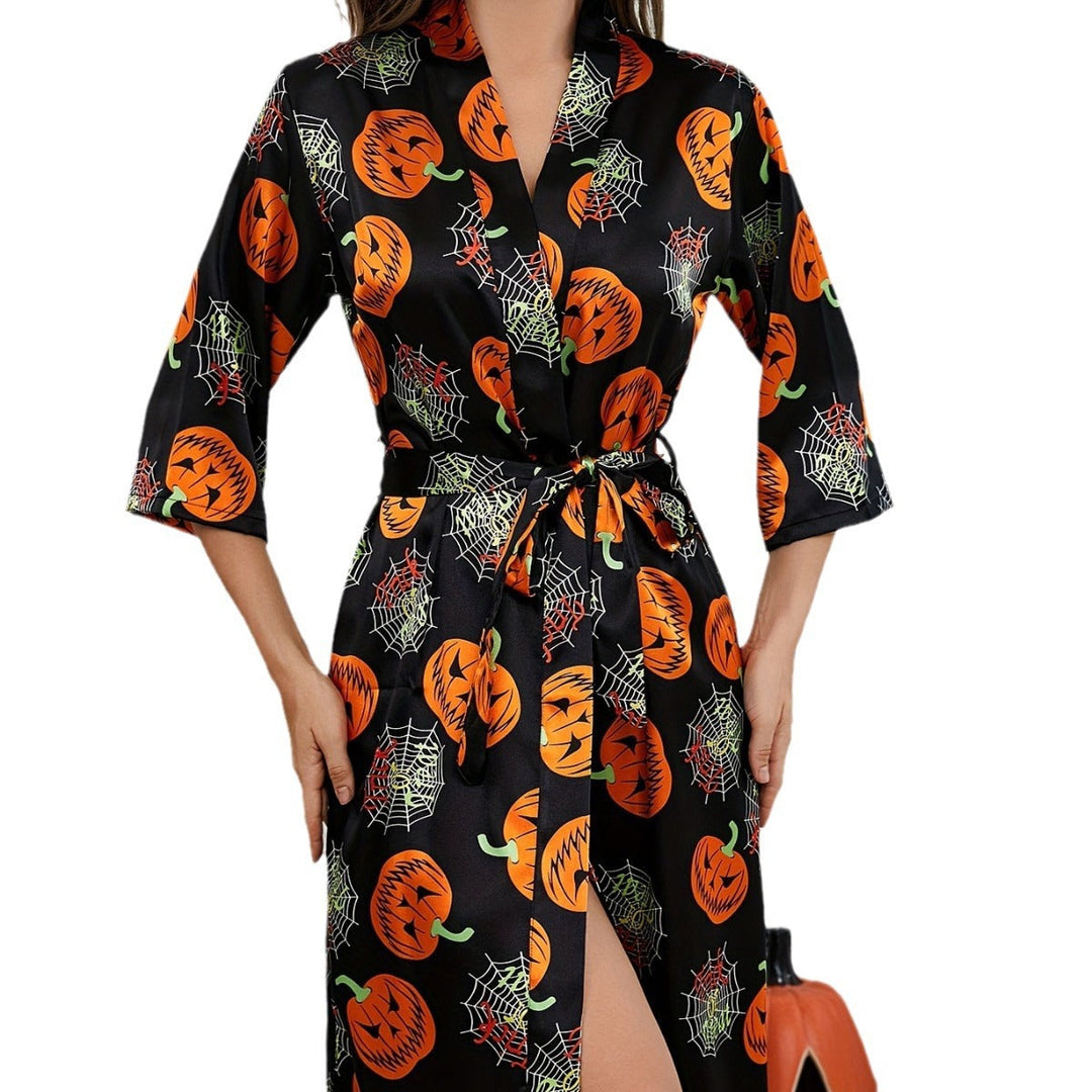 "Damernas Halloweenklänning med djärvt pumpamönster och lätt tyg, idealisk för festlig och bekväm halloween-look"