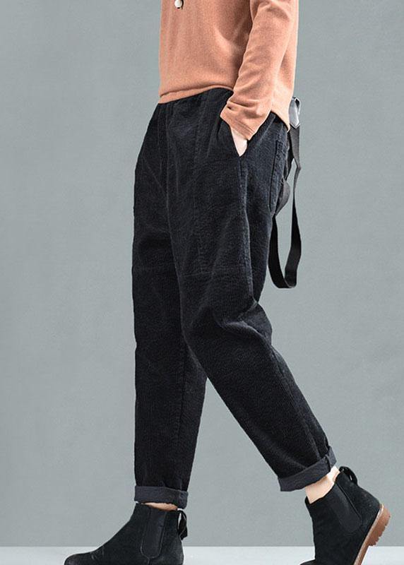 Damernas patchwork harembyxor med fickor, avslappnad passform i gröna och bruna toner för unik och bekväm stil.
