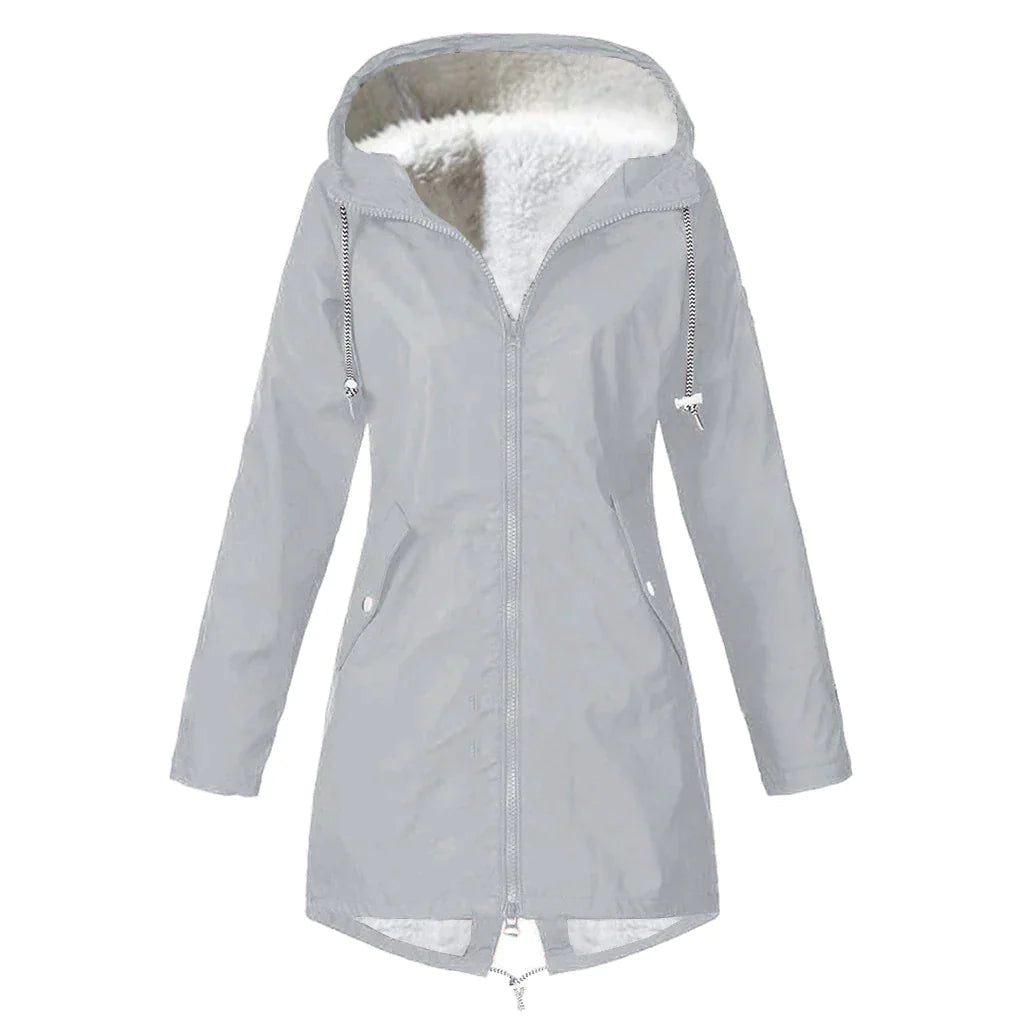 Damernas vattentäta regnjacka med justerbar huva, stilren design, flera fickor, elegant blå färg, perfekt för regniga dagar.