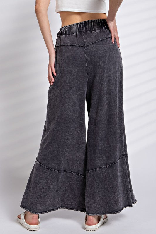 Damernas vida byxor i mjuk terry knit, elastisk midja, trendig mineraltvättad look, perfekt för både casual och elegant stil.