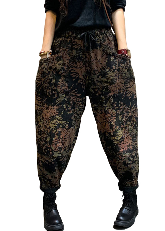 "Damjeans med cinched detaljer och mönster, figursmickrande passform och elastisk midja för stil och komfort."