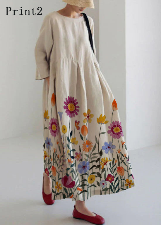 Damklänning med färgglad patchwork-design, fickor och löst snitt, perfekt för vår- och sommardagar.