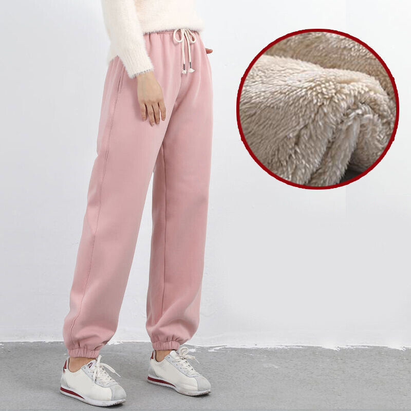 "Dams joggingbyxor med tjock fleece, elastiskt midjeband och smal passform i grått, idealiska för vinterträning."