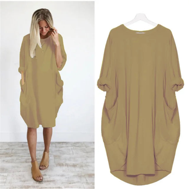 "Dams klänning oversized, rund hals, mjukt tyg, lös passform, dolda fickor, elegant stil, perfekta för alla tillfällen."
