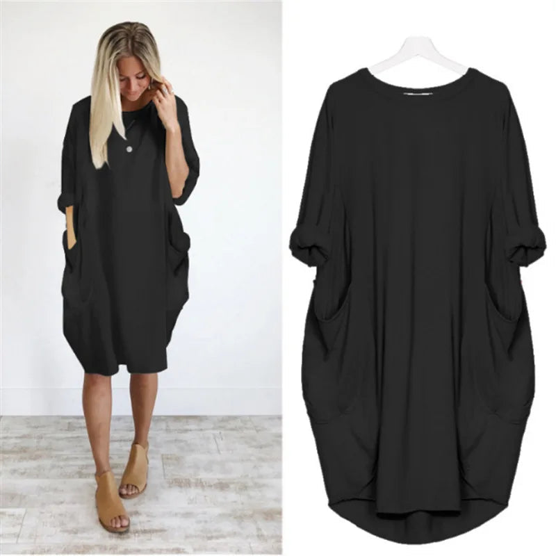 "Dams klänning oversized, rund hals, mjukt tyg, lös passform, dolda fickor, elegant stil, perfekta för alla tillfällen."