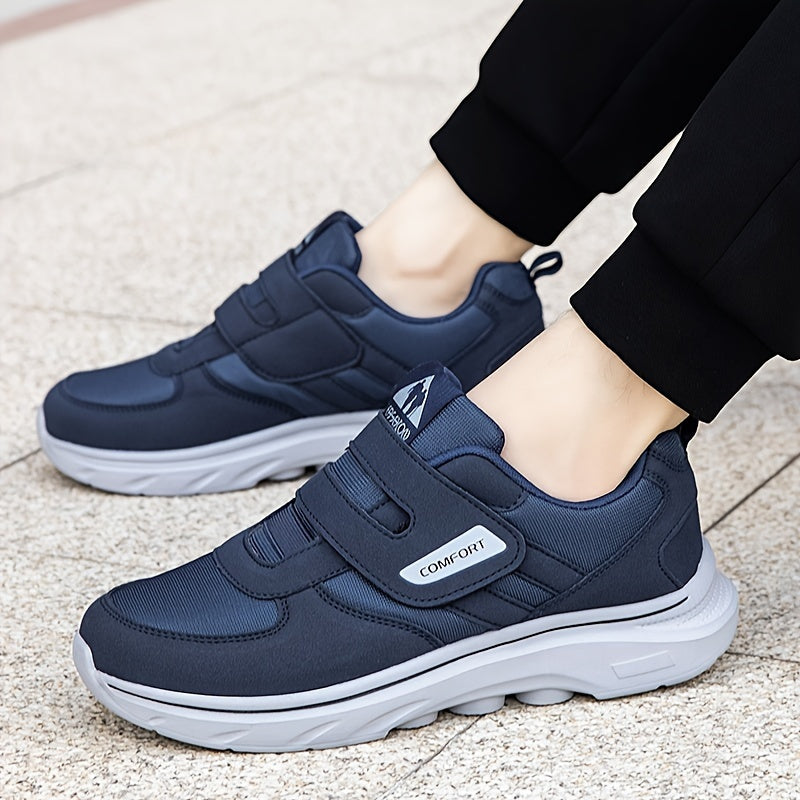 "Damskor loafers i mörkblått med klittenband, syntetiskt material, modern design, eleganta och bekväma för alla tillfällen."