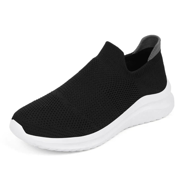 "Damsneakers i slitstark canvas med tidlös design, tillgängliga i grå, rosa och svart, idealiska för alla outfits."