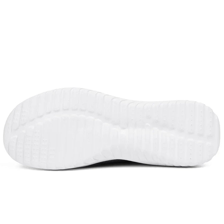 "Damsneakers i slitstark canvas med tidlös design, tillgängliga i grå, rosa och svart, idealiska för alla outfits."