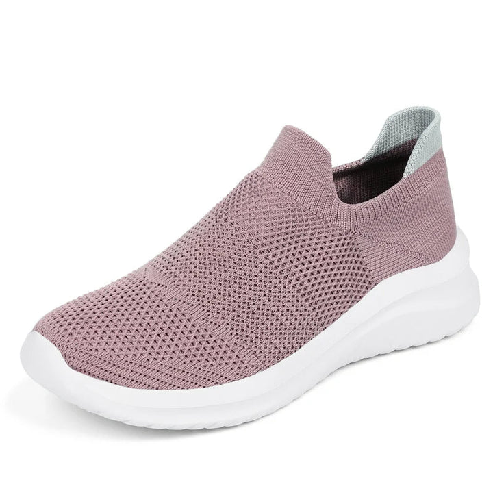 "Damsneakers i slitstark canvas med tidlös design, tillgängliga i grå, rosa och svart, idealiska för alla outfits."