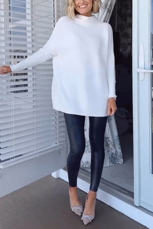 "Damtröja med mockneck, ribbade detaljer, överdimensionerad och avslappnad stil för elegans och komfort."