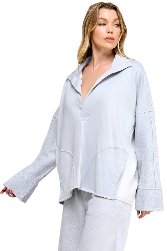 "Damtroja v-ringad med dolmanärmar i mjuk fiber, elegant och modern stil för kvinnor, avslappnad passform."