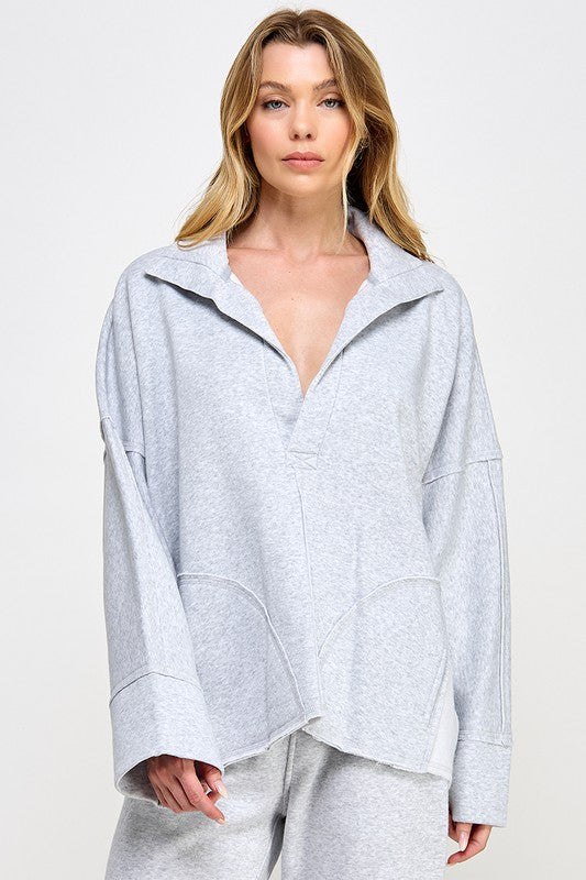 "Damtroja v-ringad med dolmanärmar i mjuk fiber, elegant och modern stil för kvinnor, avslappnad passform."