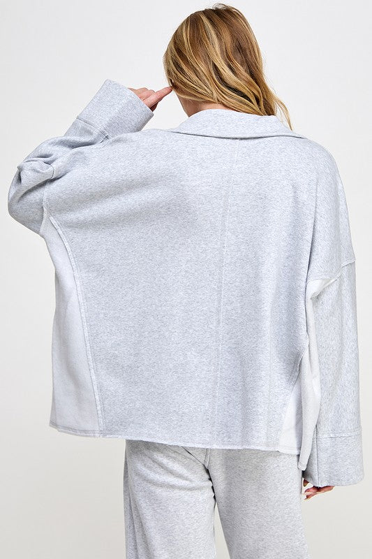 "Damtroja v-ringad med dolmanärmar i mjuk fiber, elegant och modern stil för kvinnor, avslappnad passform."