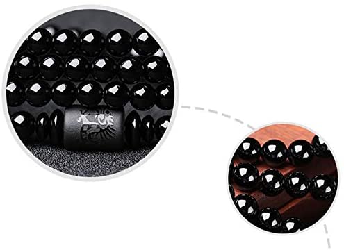 "Drake & Fenix Yin-Yang armband i svart och grått, designat för män och kvinnor med glaspärlor för harmoni och balans."