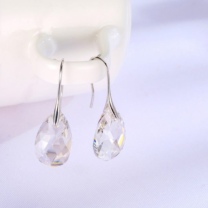 Droppformade kristallörhängen för kvinnor med blå akvamarinstenar och CZ-zirkonia, pläterade med sterling silver.