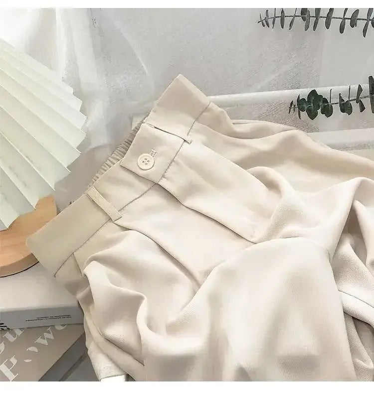 Elastiska byxor med hög midja för dam, blå färg, bekväm design, tidlös stil, perfekt för vardag och fest.