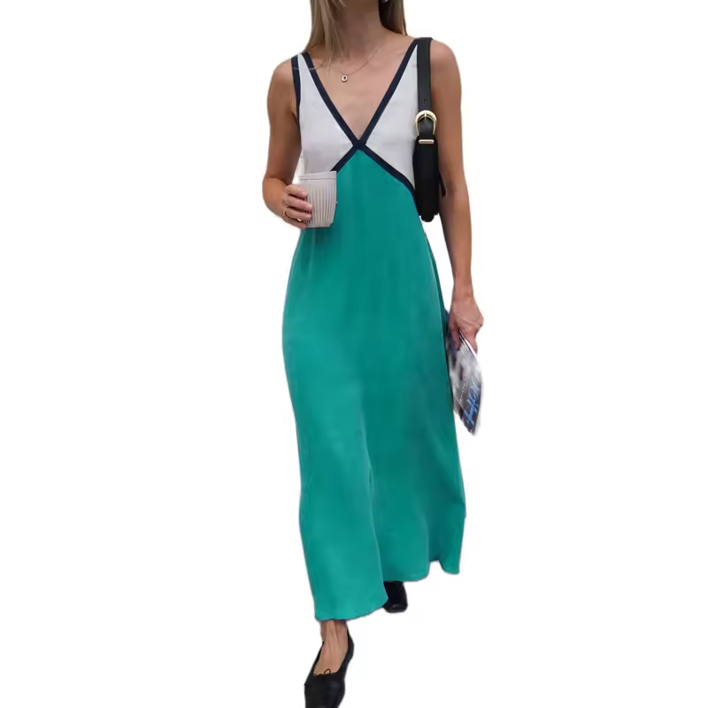 "Elegant V-ringad midi klänning med färgblock, idealisk för både casual och formella tillfällen, framsida bild."