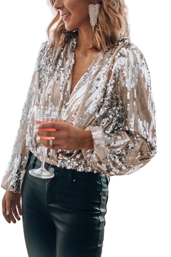 "Elegant blus med långa ärmar, silkeslen textur. Perfekt för sofistikerad stil, vardag och formella tillfällen."