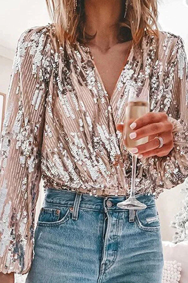 "Elegant blus med långa ärmar, silkeslen textur. Perfekt för sofistikerad stil, vardag och formella tillfällen."
