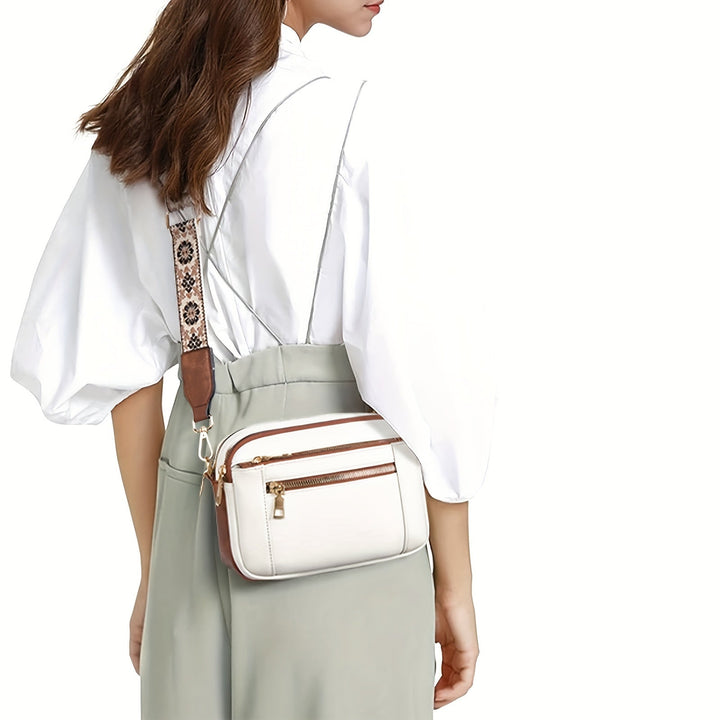 "Elegant boho crossbody-väska i PU-läder för damer, justerbar rem, djurvänlig med vintage och modern look."